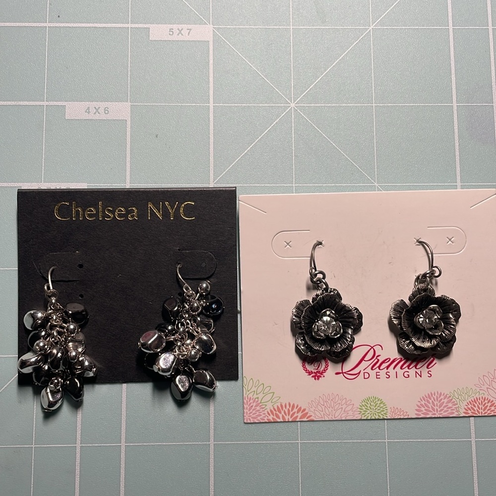 Earrings, assorted predominantly, silver in color. New never worn.